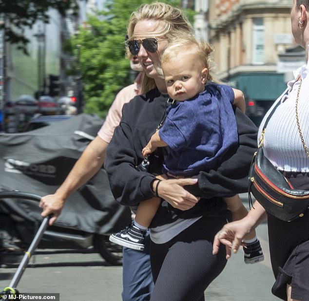 Meanwhile, Patrick's wife Brittany spent the day in London with the couple's two young children.