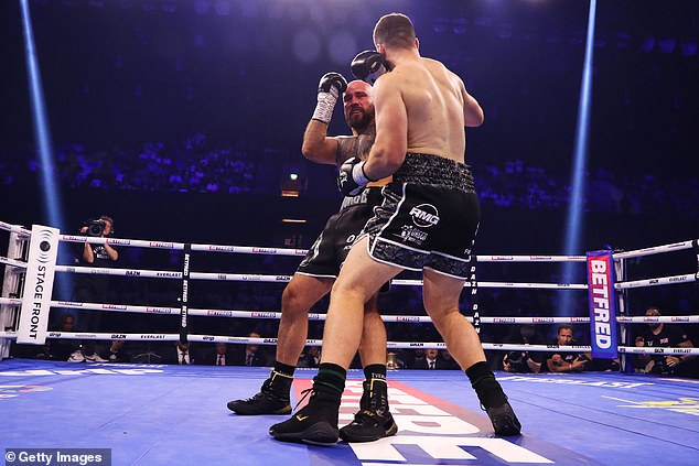 Fisher landed a series of punches just after the bell that eventually knocked his opponent down.