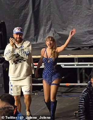 Fans went wild when they saw Kelce emerge from backstage to escort Swift back to her dressing room.