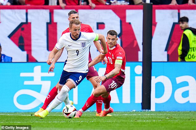 England captain Harry Kane (left) stayed on despite looking ungainly and short-legged during the game.