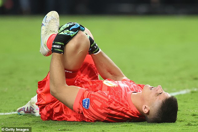 Uruguay's Sergio Rochet lies on the ground during the quarter-final match against Brazil