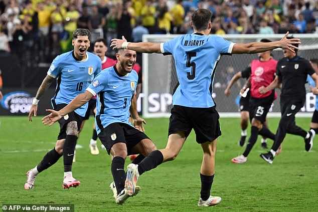 Manuel Ugarte celebrates the penalty that gave Uruguay the victory and puts them into the semi-finals