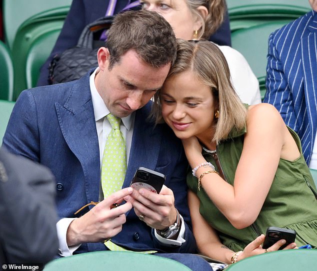 Lady Amelia was spotted snuggling up to her boyfriend Ollie Lewis at Wimbledon on Friday