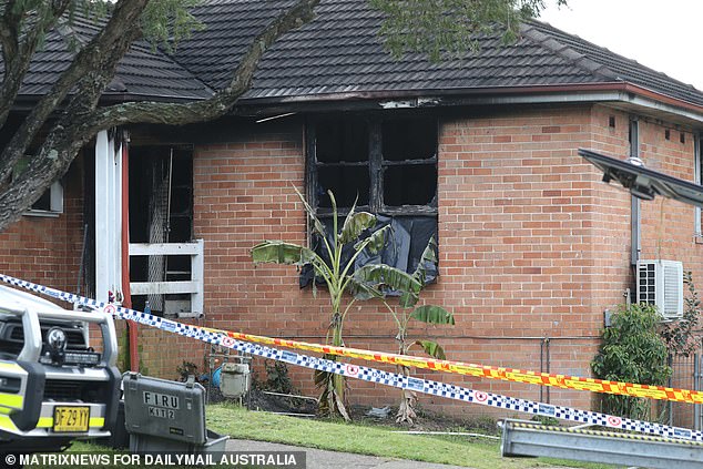 Three young children, including a 10-month-old girl, have died in a house fire (pictured) on Freeman Street, Lalor Park, in Sydney's west.