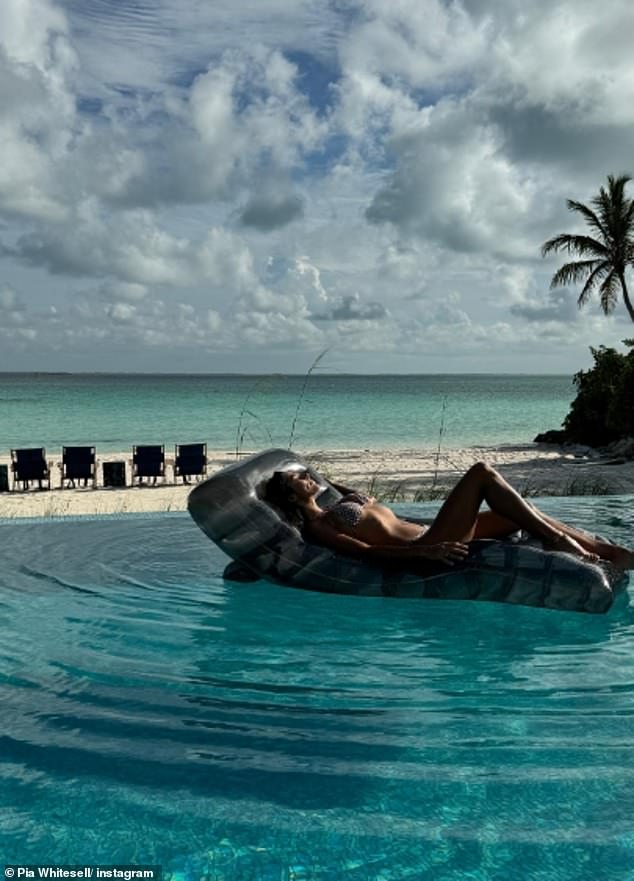 I was relaxing by the pool on an inflatable lounger before taking a ride on a small boat.