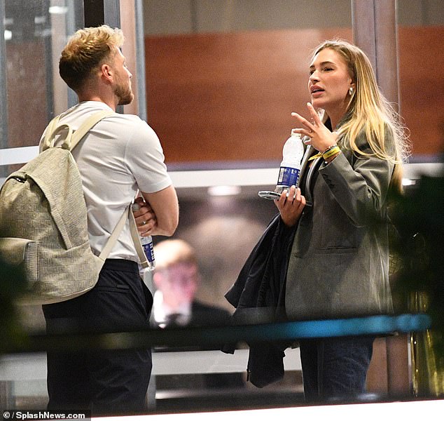 The couple's romance is said to have been on the rocks of late and the former Strictly star was seen wiping tears from her eyes as she walked up and down the street near the couple's west London home (the pair were pictured in a heated argument last month).