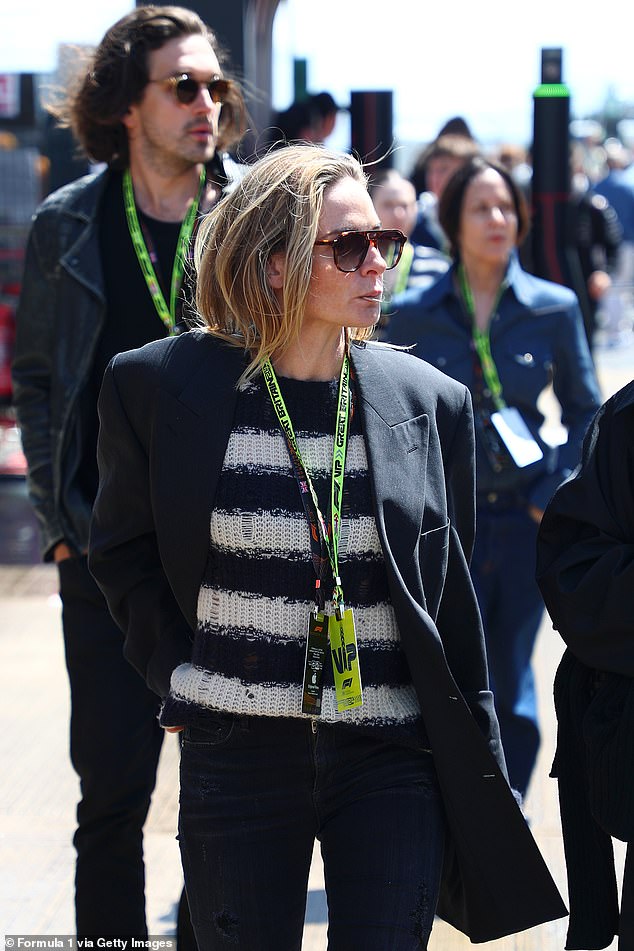 She completed her outfit with a pair of casual jeans and put on some stylish sunglasses.