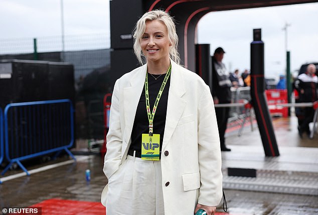 Footballer Leah Williamson was also there and looked stylish in a white suit as she strolled around the paddock.