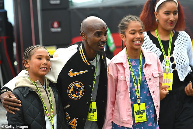 Mo Farah posed for snapshots in the paddock