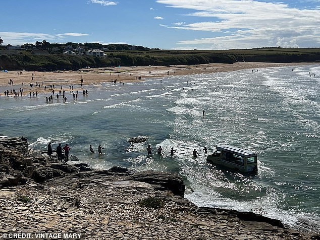 They tried to get the vehicle out of the water but eventually the truck had to be abandoned.