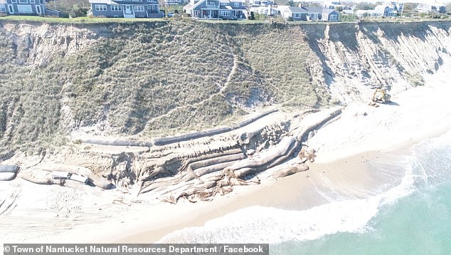 A photograph released by the Nantucket Department of Natural Resources shows properties perched precariously on eroding cliffs.