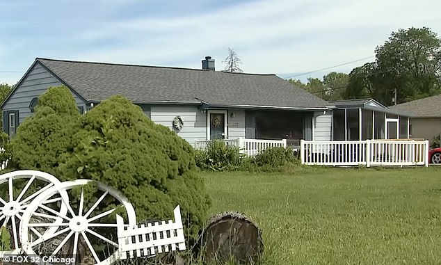 Lloyd's one-story ranch-style home is shown from the side. It has three bedrooms and one bathroom.