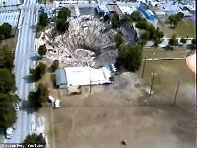 Aerial footage from 1981 shows a massive sinkhole in Winter Park, Florida, that caused a car dealership to collapse, resulting in vehicles remaining submerged to this day.