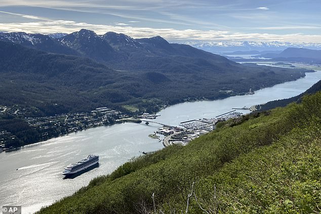 A cruise ship departs downtown Juneau on June 7, 2023, along the Gastineau Channel.