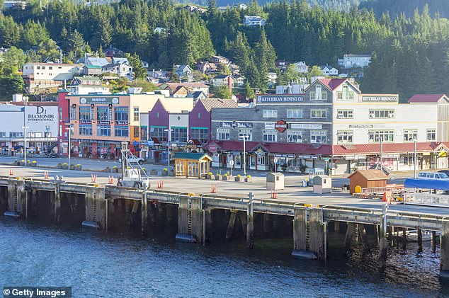 Close-up view of downtown Juneau. A Harley Davidson store can be seen.