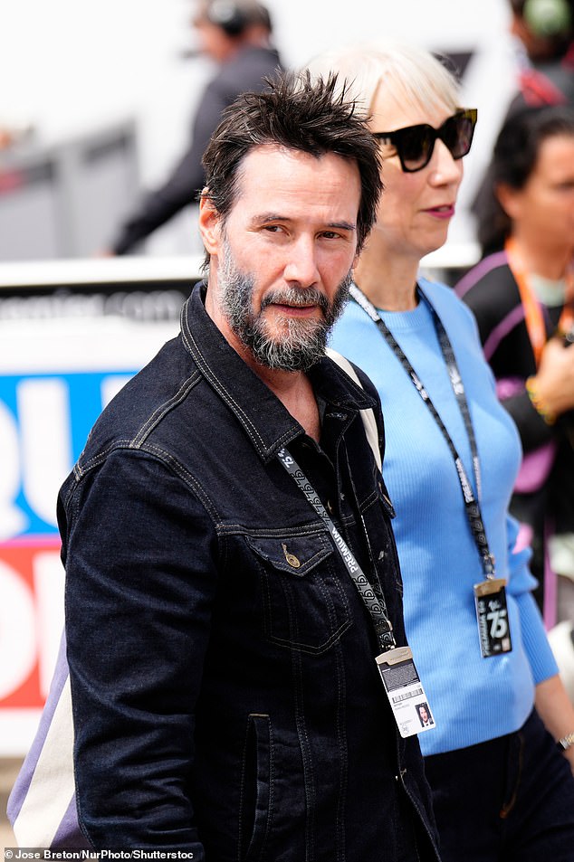 The John Wick actor, 59, and the accomplished visual artist, 54, looked casually chic and totally in love at the Liqui Moly Motorrad MotoGP Grand Prix in Germany.