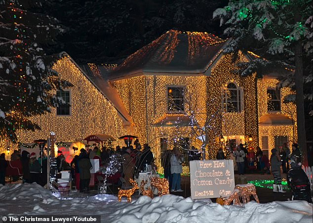 Thousands of people flocked to see the brilliant spectacle of 200,000 lights, costumed characters, musicians and a children's choir.