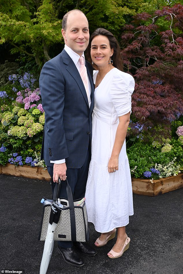 Lord Frederick, King Charles' second cousin and only son of Prince and Princess Michael of Kent, beamed as he sweetly carried his wife's handbag.