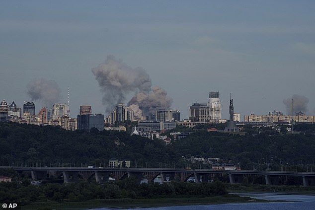 Smoke rises over the skyline of kyiv following a Russian attack, Monday, July 8, 2024