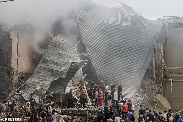 Rescuers work at the Ohmatdyt Children's Hospital that was damaged during a Russian missile strike, amid Russia's attack on Ukraine, in kyiv, Ukraine, July 8, 2024.