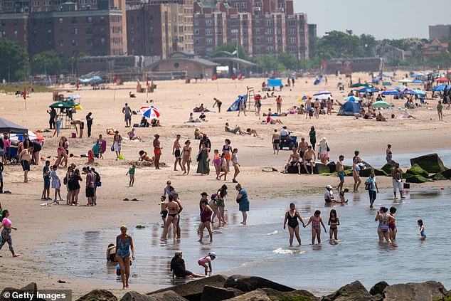 Globally, June 2024 was the hottest June since at least 1940, when EU department records began. Pictured, people cool off at Coney Island on a sweltering afternoon on the first day of summer, June 20, 2024, in New York City.