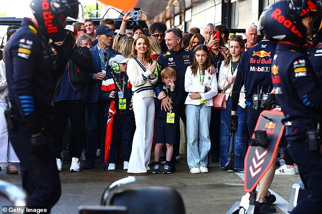 The Spice Girl, 51, and her Red Bull racing boss husband, 50, looked like the perfect family as they posed for pictures with their children at the event.