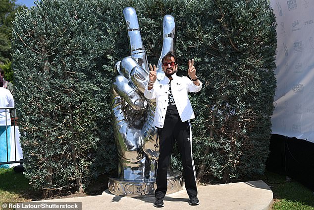 The musician, whose real name is Richard Starkey, looked younger than ever, sporting a modern image in a white denim jacket and a printed T-shirt.