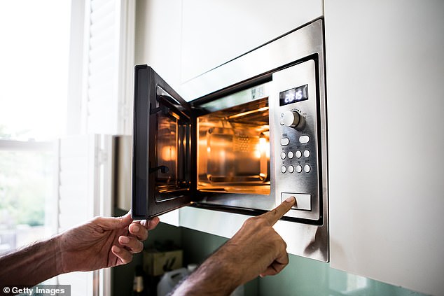 The source of those buffering web page loads and emails stuck in Outboxes could be your home microwave (file image)