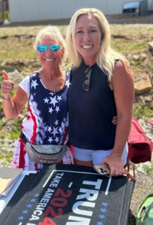 Greene is shown here with a supporter at Lake Allatoona on Sunday.