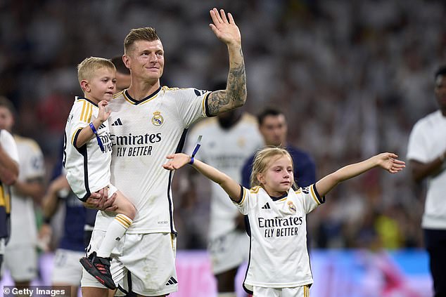 Kroos said that as his seven-year-old daughter (pictured with her father in May) gets older, he would prefer her to go out at night in Spain rather than in her home country.