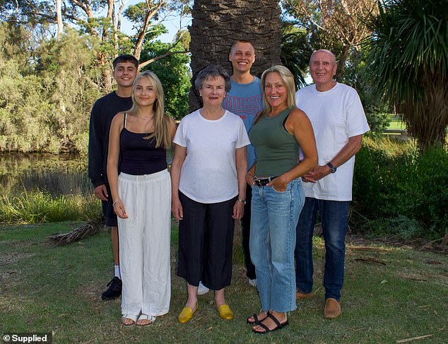 Julia, pictured with her siblings, grandfather and mother Jen Baressi (front right), was rushed to intensive care at a hospital in Bali and given anti-seizure medication before being flown to Australia and taken to Royal Melbourne Hospital.