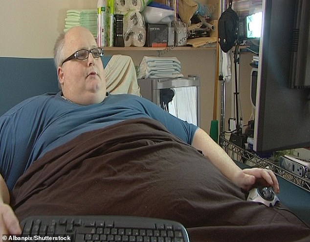 Paul, who rose to fame on TLC's The Fattest Man in the World, said that when he was heavier he would pull out his teeth as they crumbled due to his 40-chocolate-bar-a-day diet (pictured, 2009).