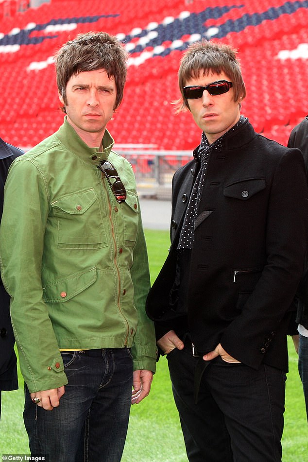 The singer and the rockers were locked in a war of words for more than two decades, with Robbie even challenging frontman Liam to a boxing match at the Brit Awards (Liam and Noel pictured in 2008).