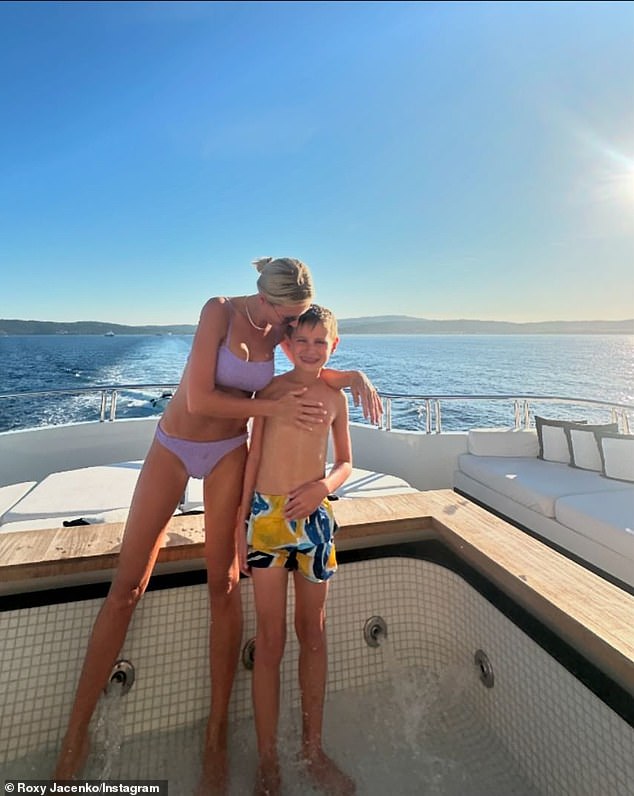 The 44-year-old PR mogul shared a series of photos on Instagram on Monday as she enjoyed the summer sun on a luxury yacht with her children.