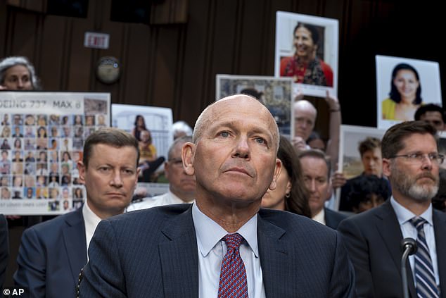 Among the protesters, Boeing CEO Dave Calhoun is seen testifying before the Senate Homeland Security and Governmental Affairs Investigations Subcommittee on Capitol Hill in Washington last month.