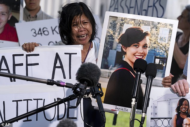 Clariss Moore, mother of Danielle, one of the victims of the Boeing 737 Max 8 crash in Ethiopia, holds her photo as she speaks at a news conference on Capitol Hill last month.