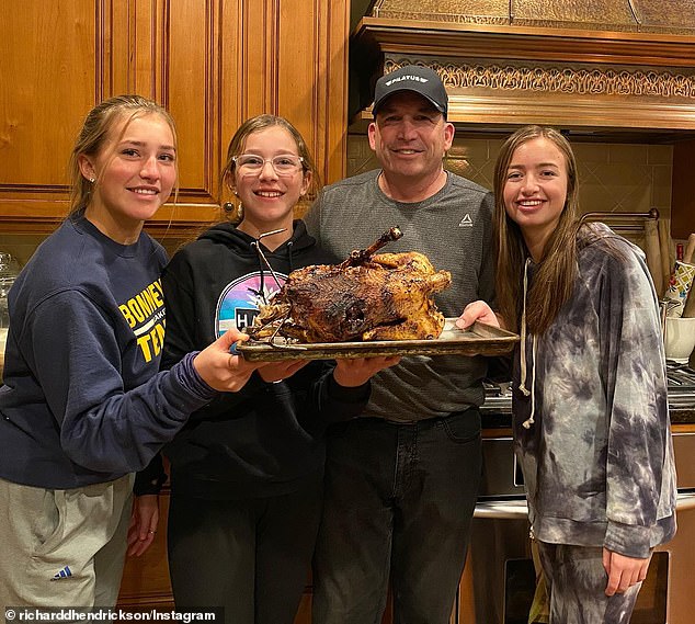 Father Richard Hendrickson is pictured with his three daughters, Lyssa, left, Sally, second from left, and Mollie, right.