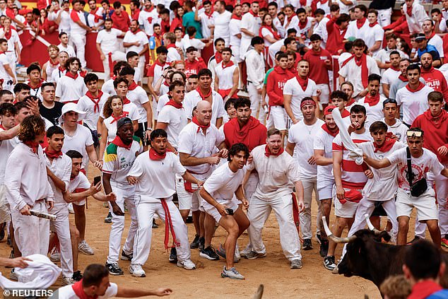 During the San Fermín celebrations, it is traditional to dress in white with a red sash and scarf.