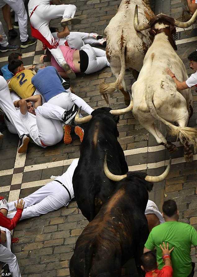 Fall in attendance on the third day of bull runs in Pamplona on Tuesday