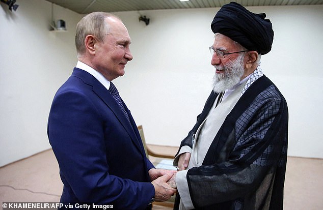 The office of Iranian Supreme Leader Ayatollah Ali Khamenei is shown (right) receiving Russian President Vladimir Putin in Tehran, July 19, 2022.