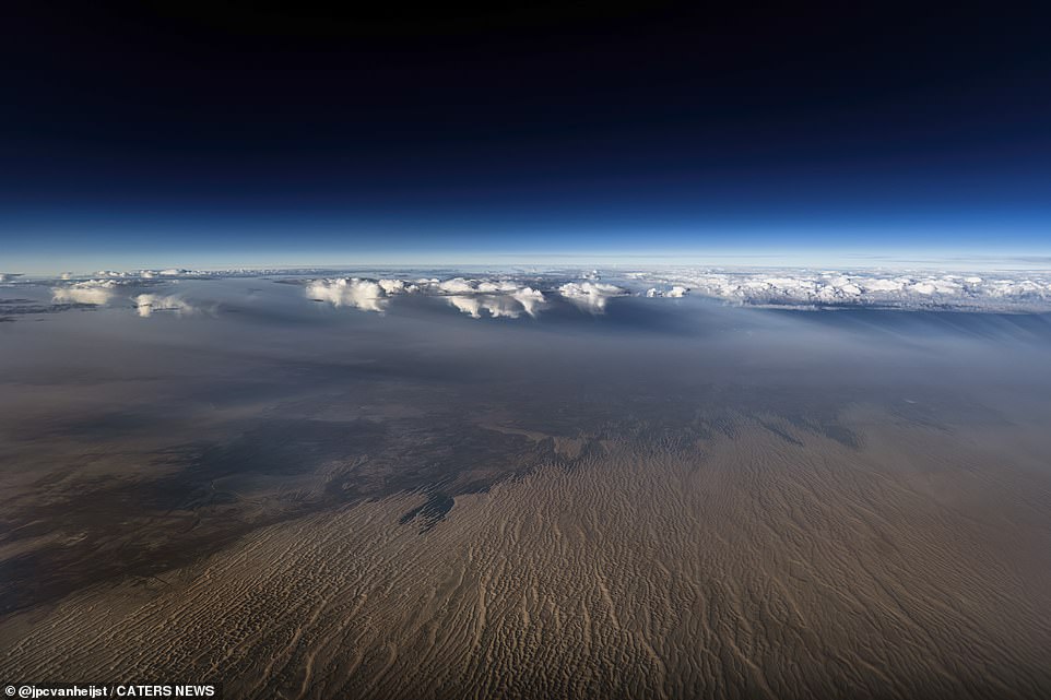 Here, the vast Gobi Desert stretches out beneath Christiaan's jumbo jet.