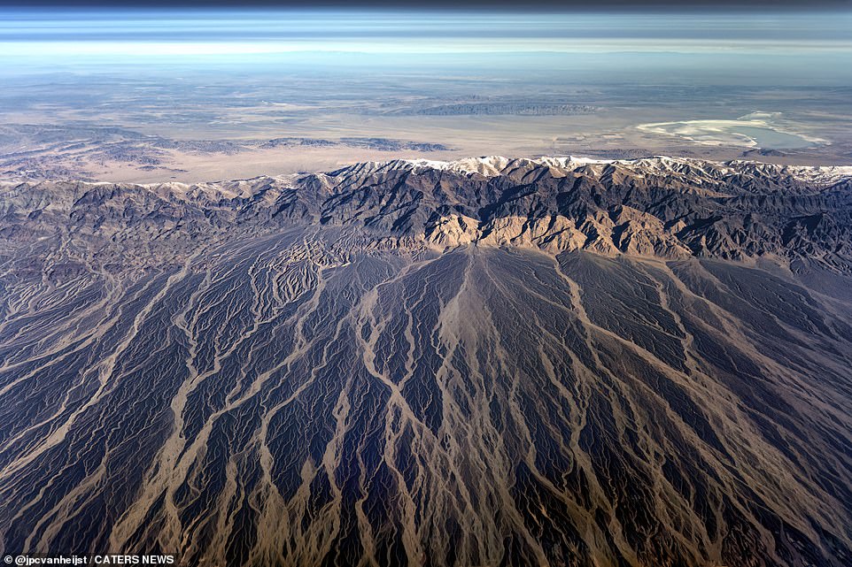 An impressive mountain range in China. Christiaan calculates that he has flown 17 times the distance from Earth to the Moon