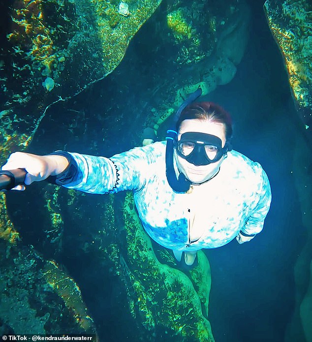 While Kendra primarily films herself while diving, she said she never dives alone and is always accompanied by two safety divers who know how to safely bring her to the surface in case of danger.