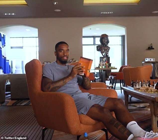 Joker Toney pauses to read, without looking, in the behind-the-scenes show of England's Diary Room