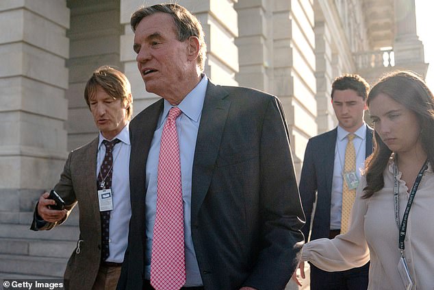 Sen. Mark Warner (D-Va.) called for talks on the strongest path forward. He says Trump is a threat to democracy.