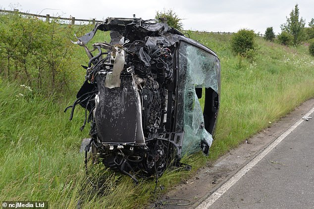 A gruesome photo of Anderson's wrecked Audi