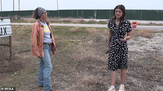 Pictured above, a local resident is seen with a journalist as they discuss the noise, which has been compared to that of a jet engine.