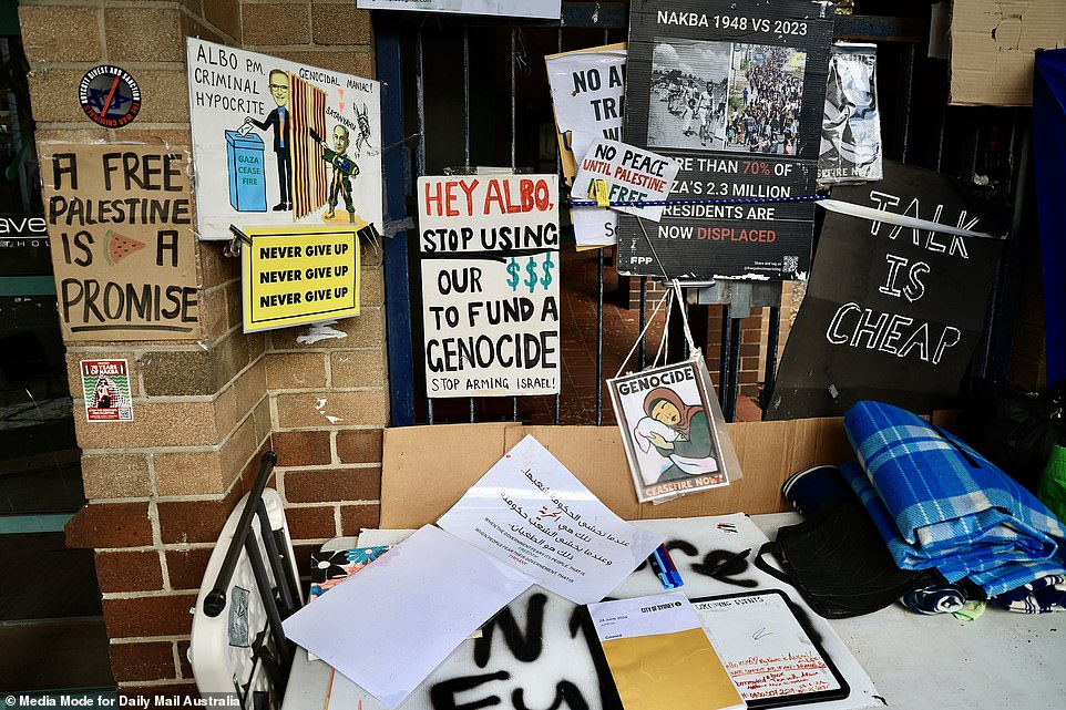 Some of the signs found on the front of the property.