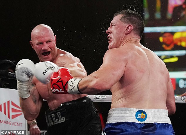 The former Swans captain (pictured in his first professional fight against NRL great Paul Gallen) believes he will stop Scott in Wednesday night's bout.