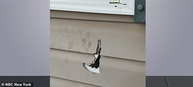 A hole was left in one house where a piece of metal from the explosive passed through.